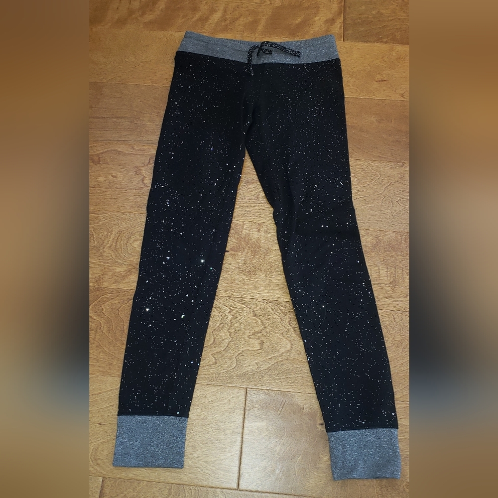 Girls leggings with lots of sparkles. Size 7/8, SO brand. New, no tags